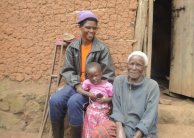 Athanasie Mukabizimungu, Cooperative Chairperson, with family