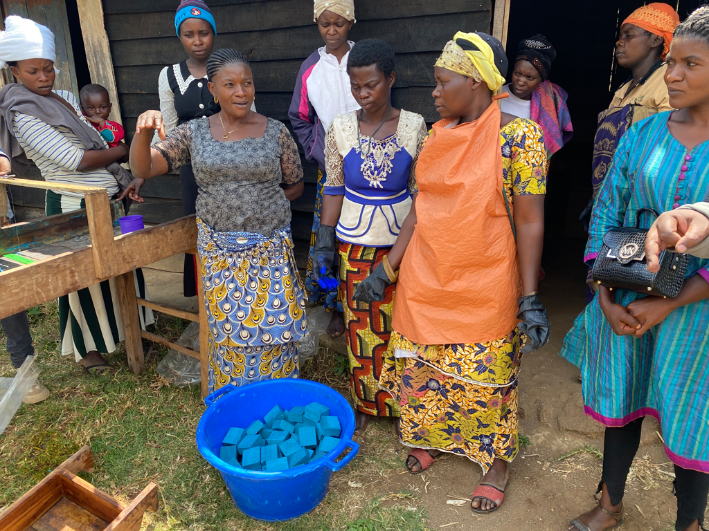 Congolese women display homemade soap