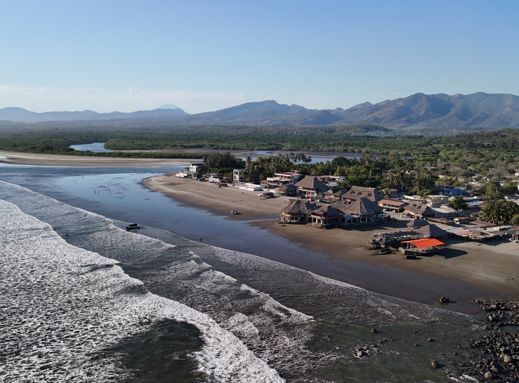 Drone footage from Punta Amapala showing a beach and a town